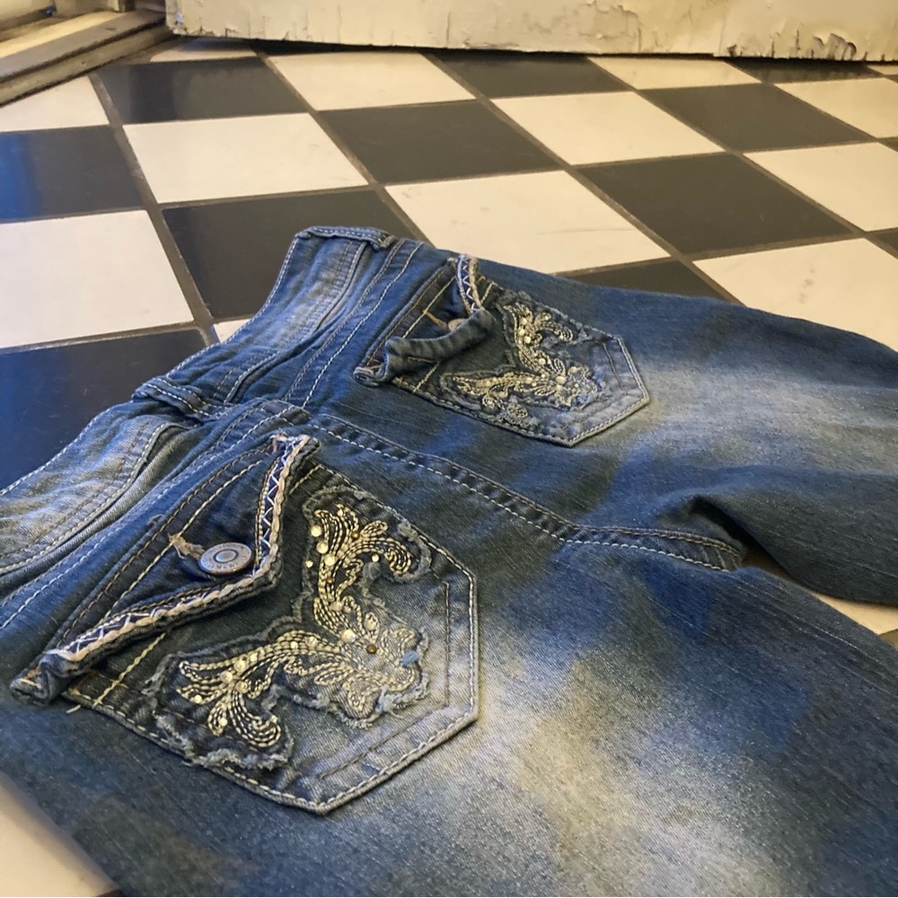 Stylish Blue Jeans with Embroidered Pockets